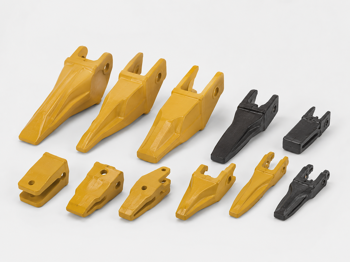 Cover — Outils de terrassement (godets, dents, adaptateurs)